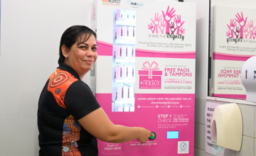 Aboriginal Development Officer, Kezha Bin Swani with the PinkBox Vending Machine.